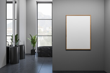 Front view on dark bathroom interior with empty white poster