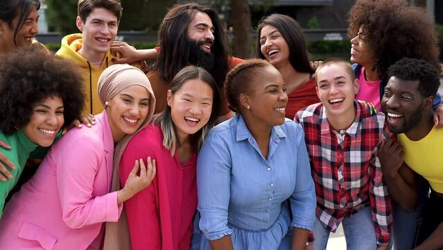 Young multiracial people having fun together in the city