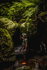 Hiker in the dark forest