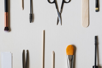 Beauty concept image including tools, products and equipment for tinting, waxing, facials and...