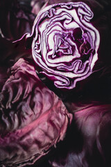 Obraz premium Raw red cabbage leaves. Purple texture of vegetables. Purple leaves and background
