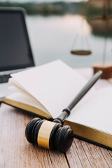 justice and law concept.Male judge in a courtroom on wooden table and Counselor or Male lawyer working in office. Legal law, advice and justice concept.