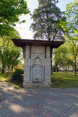 Fototapeta na wymiar Mihrisah Valide Sultan Fountain is located in the park by the sea in Yenikoy. Cesme was built in 1805 by the III. It was built by Selim's mother Mihrisah Sultan.