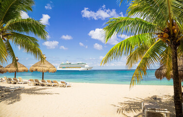 Fototapeta na wymiar View from tropical beach on cruise ship sailing from port 