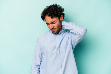 Young caucasian man isolated on white background suffering neck pain due to sedentary lifestyle.