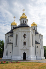 Fototapeta na wymiar Ancient Ukrainian Orthodox Church. Ukrainian baroque architecture. Catherine's Church is a functioning church in Chernihiv, Ukraine. Church is distinguished by its five gold domes in the Baroque style