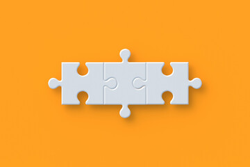 Three jigsaw puzzle pieces on orange background. 3d render