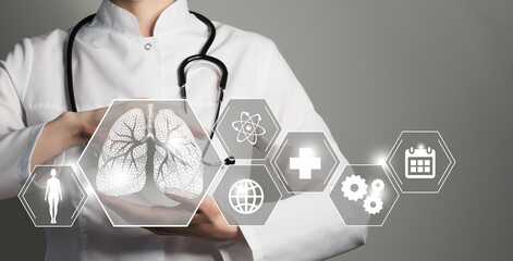 Unrecognizable female doctor holding graphic virtual visualization model of Lungs organ in hands....