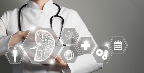 Unrecognizable female doctor holding graphic virtual visualization model of Spleen organ in hands....