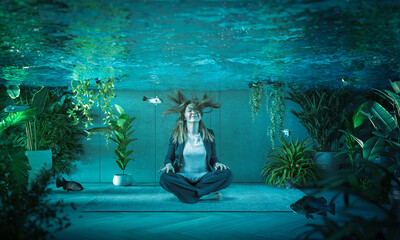 woman relaxes underwater in a flooded room