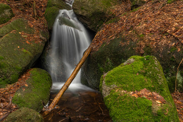 Cerveny creek with Cerveny waterfall in Jizerske mountains in spring morning