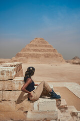 Traveler in Egypt seeing the world's first pyramid. Saqqara