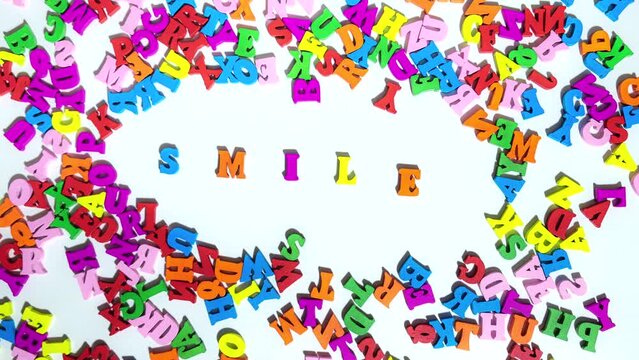 Multicolored Letters Smile on The White Background. Letters of The Word Smile. motion 2d
