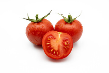 Fresh sliced ​​tomato isolated on light background