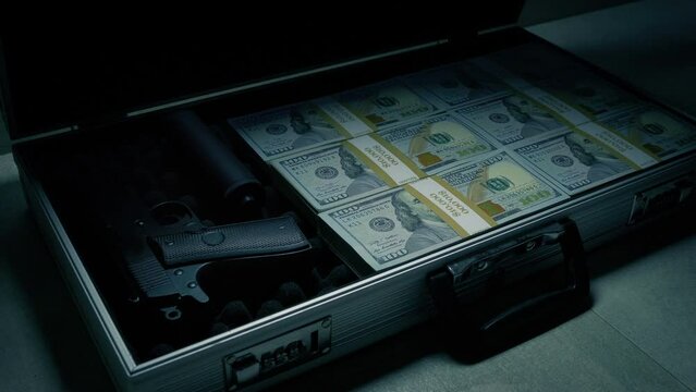 Hitman Opens Briefcase With Gun And Money And Goes Off