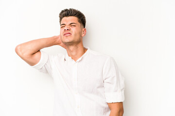Young caucasian man isolated on white background massaging elbow, suffering after a bad movement.