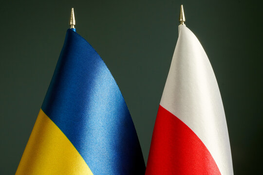 Flags of Ukraine and Poland as a symbol of partnership.