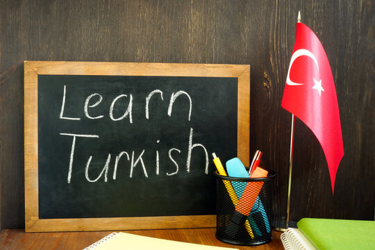 Learn Turkish. A small board and a flag nearby.