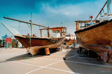 Foto op Canvas Dhows on drydock at the port of Al Mina, Abu Dhabi, United Arab Emirates © Christian Schmidt 