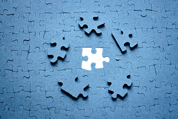 missing piece of puzzle with  light, perfect solution concept, the key to success