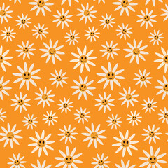 Cute smiling white daisy flowers seamless pattern on orange background in retro style. For textile, baby shower and gift wrapping paper 
