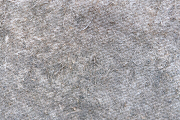 Background old gray fiberboard close-up copy space. 