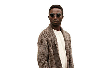 Portrait of stylish young african man model looking away wearing knitted cardigan isolated on white background