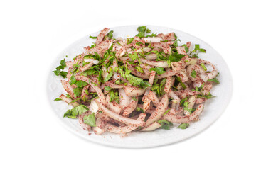 Turkish onion salad is served with kebab accompanied by lemon and parsley.