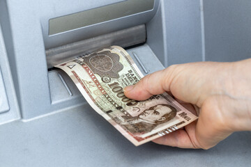 Paraguay currency withdrawn from the ATM, Financial and economic concept related to inflation and...