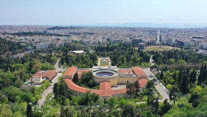 Obraz premium Aerial photo taken by drone of iconic public Zappeio hall used for events and whole Athens cityscape at the background, Attica, Greece