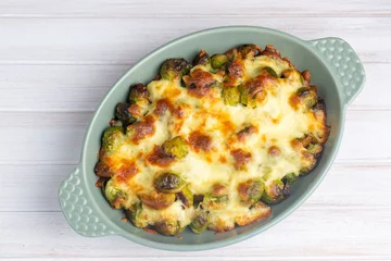 Deurstickers Brussels sprouts baked with cheese, gratin © Esin Deniz