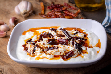 Traditional Turkish and Greek Meze with chili peppers. Turkish Appetizer Atom with yogurt. Turkish...