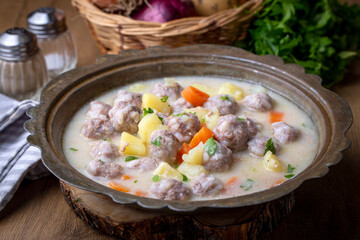 Seasoned soup with meatballs with vegetables. Turkish name; sulu kofte, eksili kofte, terbiyeli...