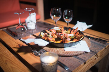 Fresh Paella dish on the table