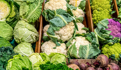 Vegetable market. Stall with white cabbage and cauliflower