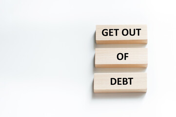 GET OUT OF DEBT text on wooden bars on a white background lie one after another