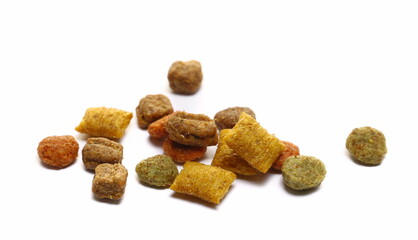 Close up dry cat food isolated on white background