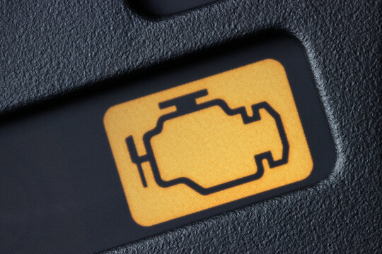engine warning light in car dashboard