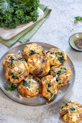 Vegetarian egg muffins with mushroom, green kale and feta cheese for Healthy keto diet Breakfast or lunch