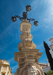 Nice monument under sunny sky in Seville city, Andalusia, Spain