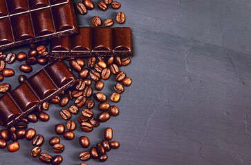 Dark chocolate and coffee beans flat lay. Brown background.Copy space.