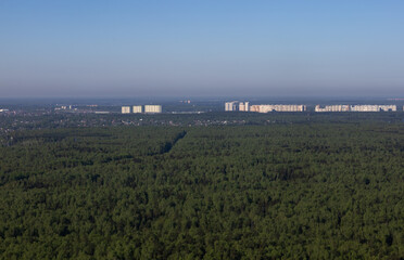 Fototapeta premium bird's eye view of the city forest and fields