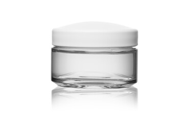 transparent gel cream for moisturizing the face in transparent glass jar and white plastic lid on...