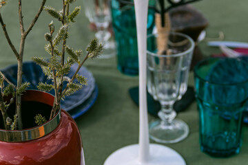 a table set in nature at the dacha in spring for lunch or dinner