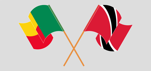Crossed and waving flags of Benin and Trinidad and Tobago