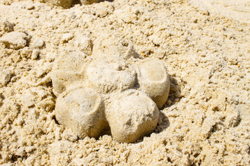Children's sandbox. Sandbox molds. Children play in the sandbox. Sand on the playground.