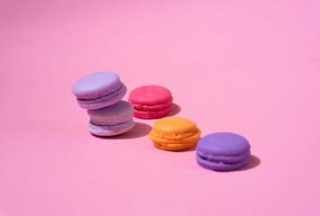 Multi-colored pasta on a multi-colored bright background. Place for text