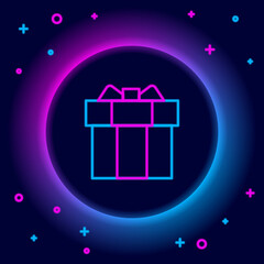 Glowing neon line Gift box icon isolated on black background. Colorful outline concept. Vector
