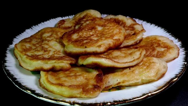 Stack of fresh fried homemade sweet pancakes.