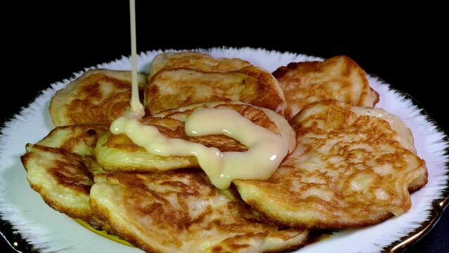 Stack of fresh fried homemade sweet pancakes.
